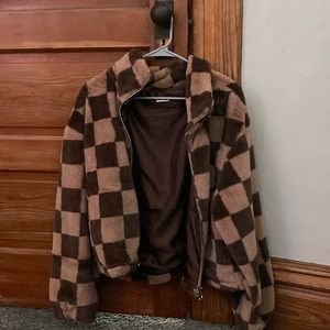 soft checkered light coat/jacket. size medium. like new